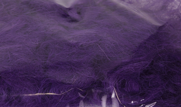 <h4>Fuzzy fibre 250 gram in poly purple</h4>