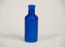 FLES ROND DONKERBLAUW GLAS MILKY D5